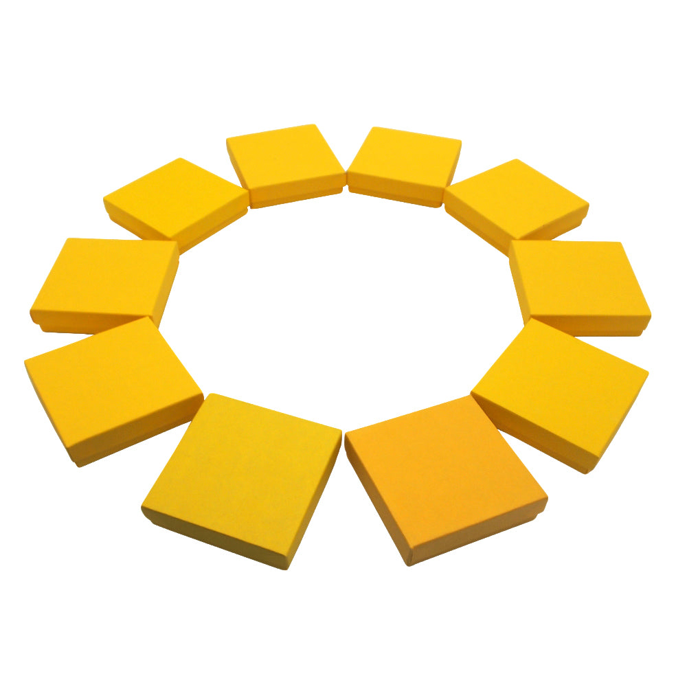 10 Yellow Kraft Cotton Filled Boxes arranged in a circle