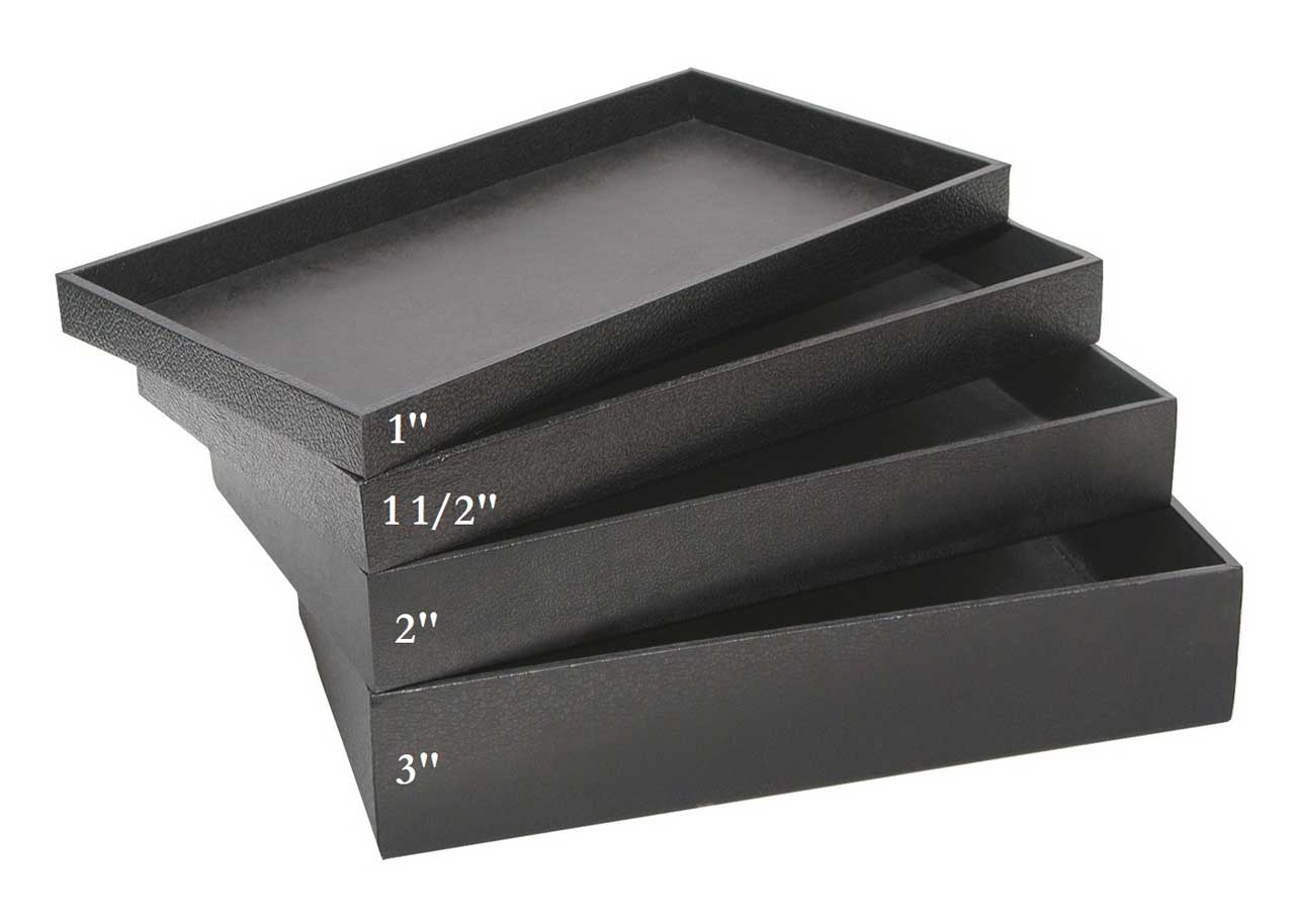 Standard Black Utility Trays stacked up to show tray height differences.