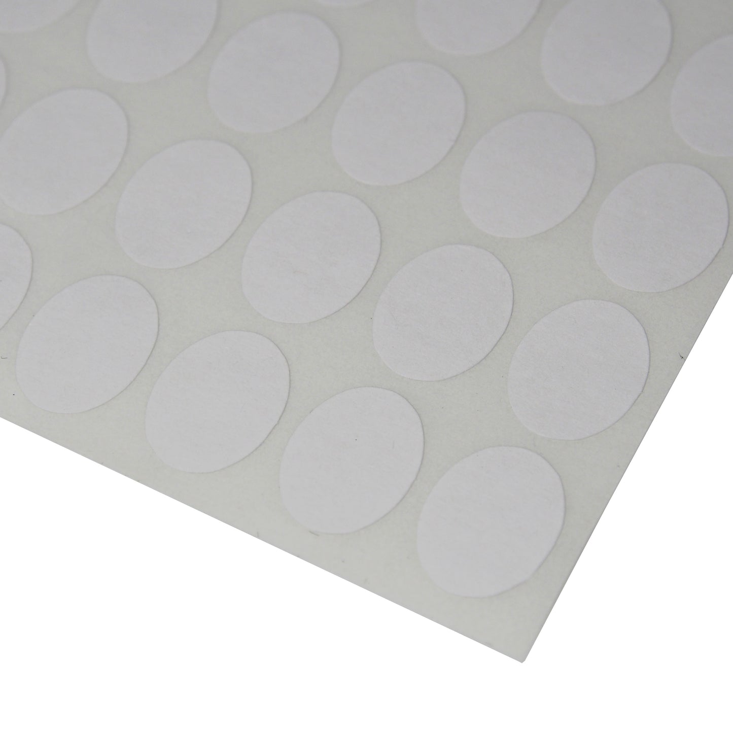 Corner of the sheet of Oval Self Adhesive Plain Label - 1040 Labels (1/2" x 3/8")